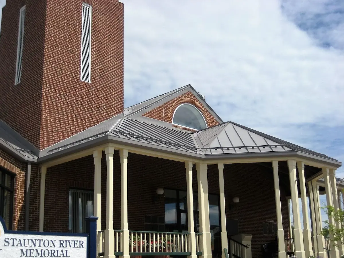 Skilled roofing craftsmen working on a residential roof in Haverhill
